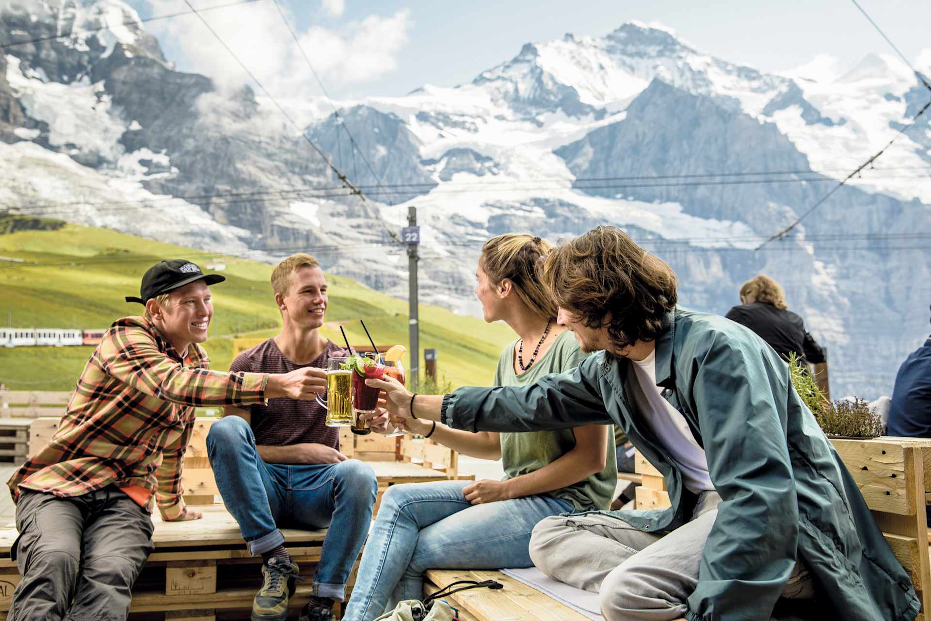 Mountain Restaurant Kleine Scheidegg, 4 people with drinks.